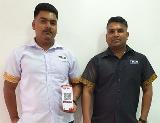 Bimal-Chand-(right)-with-a-staff-displaying-the-QR-Pay-(1)